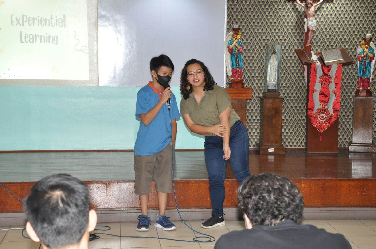 Volunteers and staff working together with core members